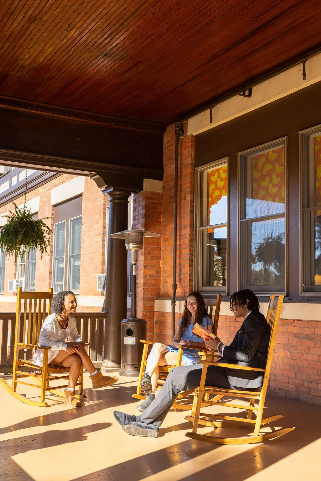 students in rocking chairs